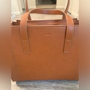 Fawn Design. The medium carryall bag. Color is brown